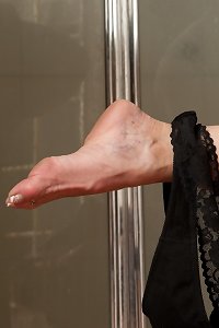 tanned granny enjoys fucking her massive boobs in kitchen